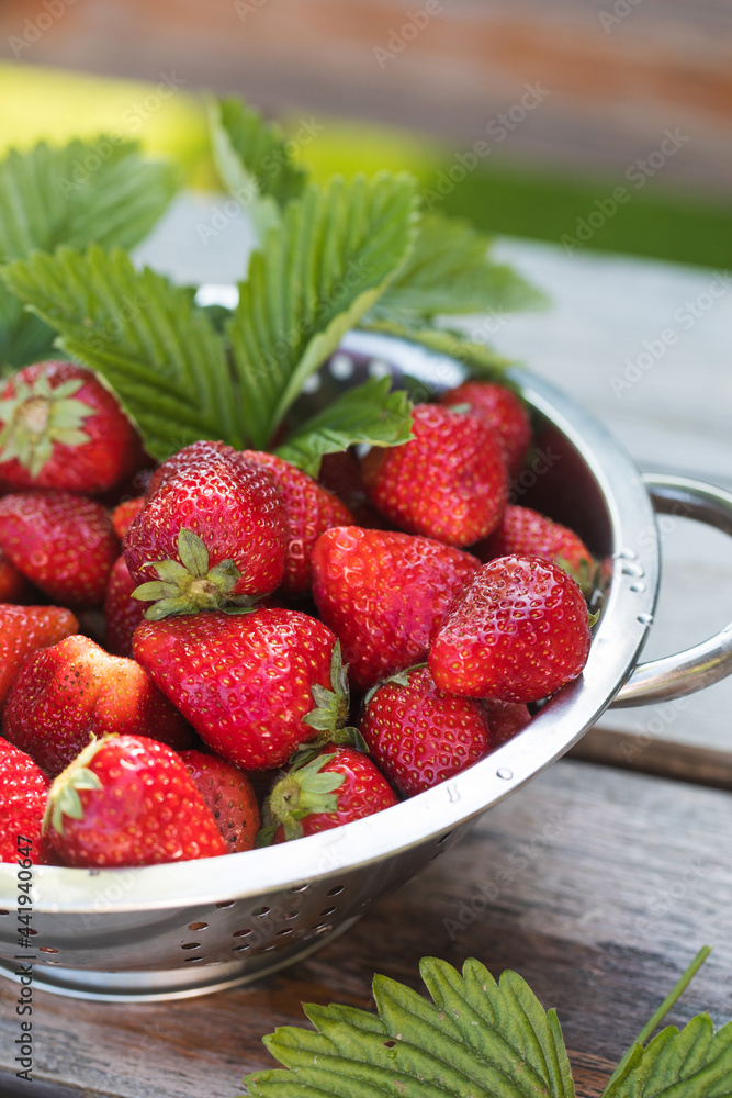 Fresh ripe strawberries on a wooden countertop. Eco-products. Fresh ripe strawberries on a wooden countertop. Eco-products.