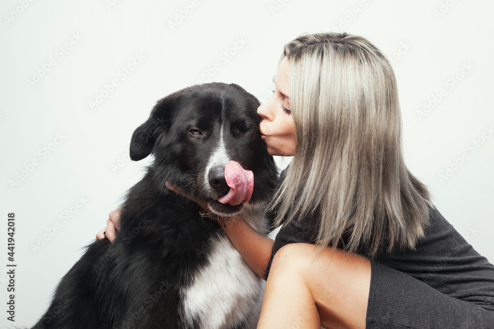 Portrait of a beautiful woman with her dog