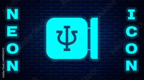 Glowing neon Psychology icon isolated on brick wall background. Psi symbol. Mental health concept, psychoanalysis analysis and psychotherapy. Vector