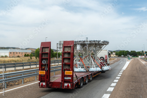 Truck for special transport circulating with a load that occupies the entire road.