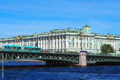 View of Saint Petersburg, Russia. Winter Palace, Palace bridge, Hermitage from Neva River in sunny summer day