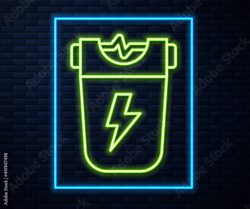 Glowing neon line Police electric shocker icon isolated on brick wall background. Shocker for protection. Taser is an electric weapon. Vector