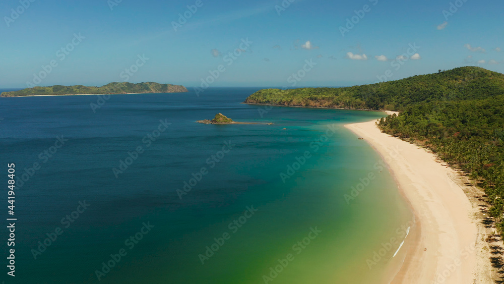 Wide sand beach Nacpan Beach, aerial view. El Nido, Palawan, Philippine Islands. Seascape with tropical beach and islands. Summer and travel vacation concept