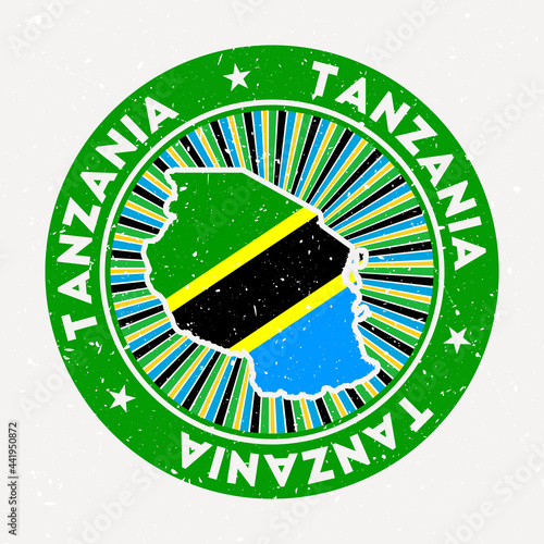 Tanzania round stamp. Logo of country with flag. Vintage badge with circular text and stars, vector illustration.