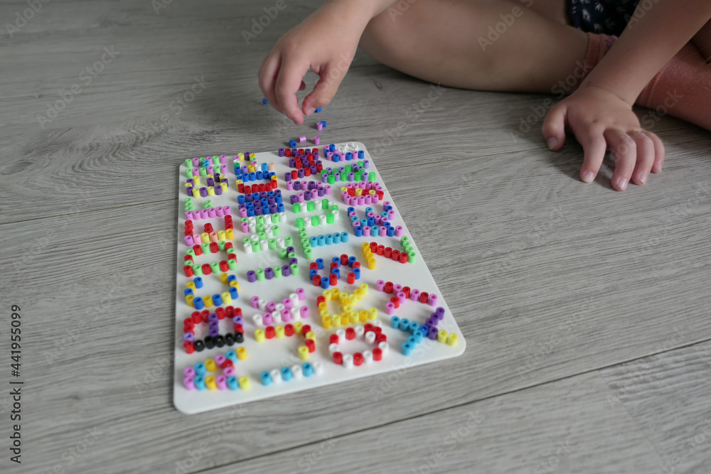 thermo mosaic letters plastic on wood floor thermo mosaic letters plastic on wood floor
