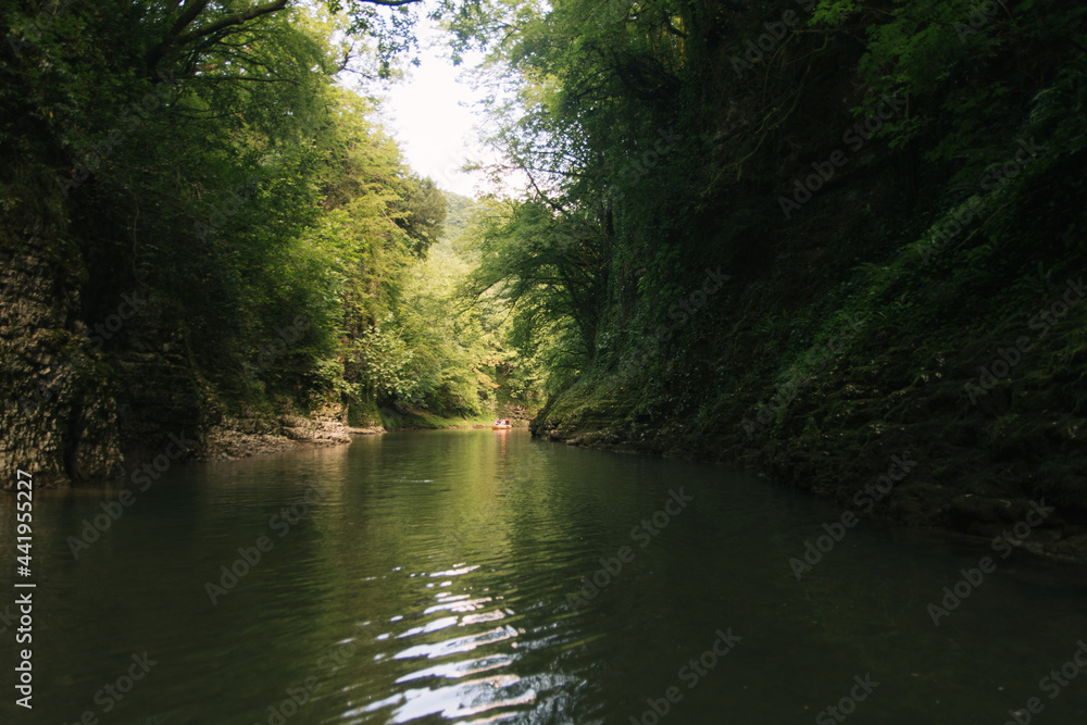 Martvili Canyon in Georgia. Turquoise water in a mountain river and cliffs of the reserve. Beautiful natural canyon Martvili Canyon in Georgia. Turquoise water in a mountain river and cliffs of the reserve. Beautiful natural canyon