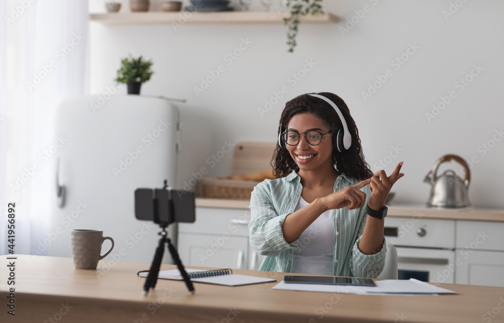 Modern tutor teaches online, devices for remote work at home Modern tutor teaches online, devices for remote work at home