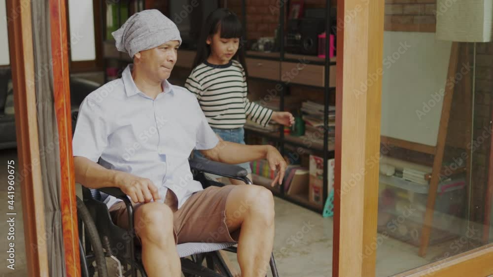 Old senior Asian man sitting in wheel chair in nusing home looking out of window and thinking. Lonely elderly man spending day alone at home. Concept of family life insurance. Old senior Asian man sitting in wheel chair in nusing home looking out of window and thinking. Lonely elderly man spending day alone at home. Concept of family life insurance.