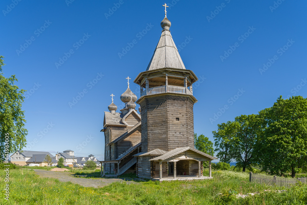 The old wooden church of Dmitry Solunsky on a June afternoon. Shcheleiki village. Leningrad region, Russia
