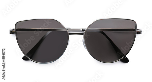 Stylish sunglasses on white background, top view. Beach object