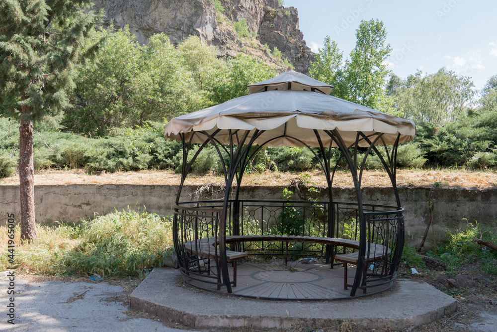 natural wooden bench and iron pergola,fabric covered roof natural wooden bench and iron pergola,fabric covered roof