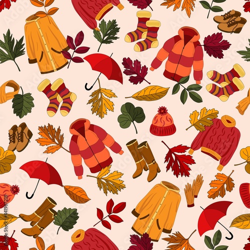 Seamless pattern with autumn clothes and leaves. Vector