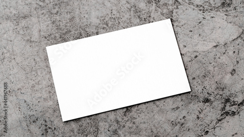 White business card on concrete for mockup. Minimal business brand template