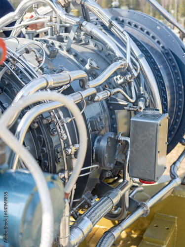 Close-up of the new engine for the ship. Mechanism with a bunch of pipes and parts