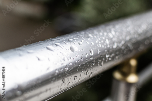water drops on handrail surface