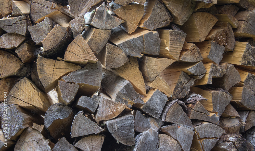 Preparation of firewood for heating the building in winter Preparation of firewood for heating the building in winter