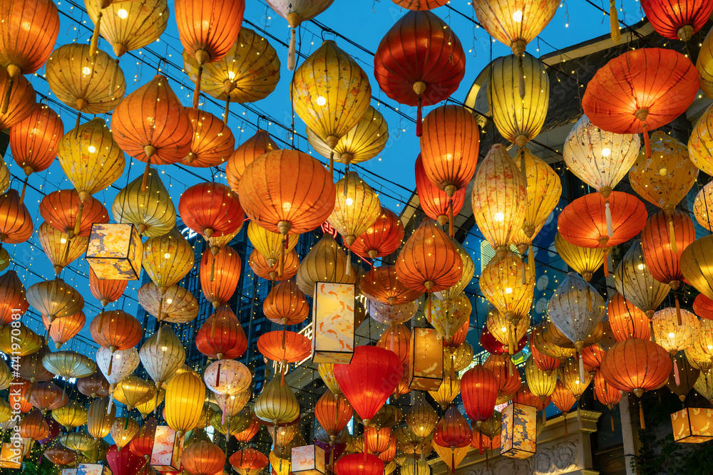 Colorful lanterns hang on the wall