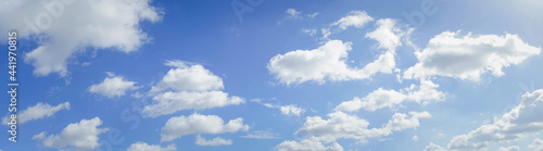 blue sky with white cloud background.