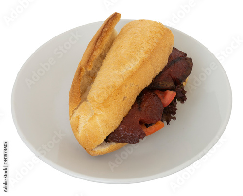 sausage between bread isolated on a white background