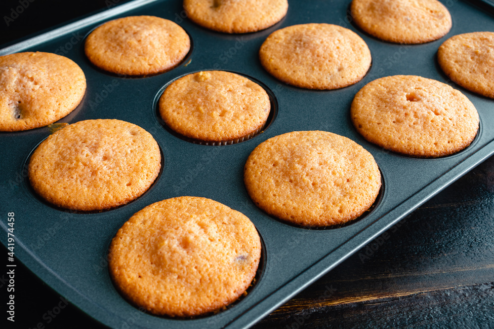 Cherry Muffins in a Muffin Pan: Cupcakes without frosting in a muffin tin Cherry Muffins in a Muffin Pan: Cupcakes without frosting in a muffin tin