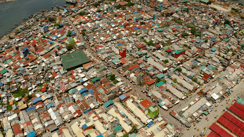 Poor area in the slums of Manila with density houses and streets from ...
