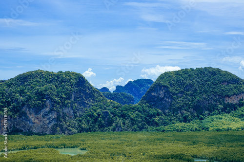 Beauty two mountain multi layer with green tree. high forest fresh air and fog in morning sunrise. Thailand tropical view in natural park.