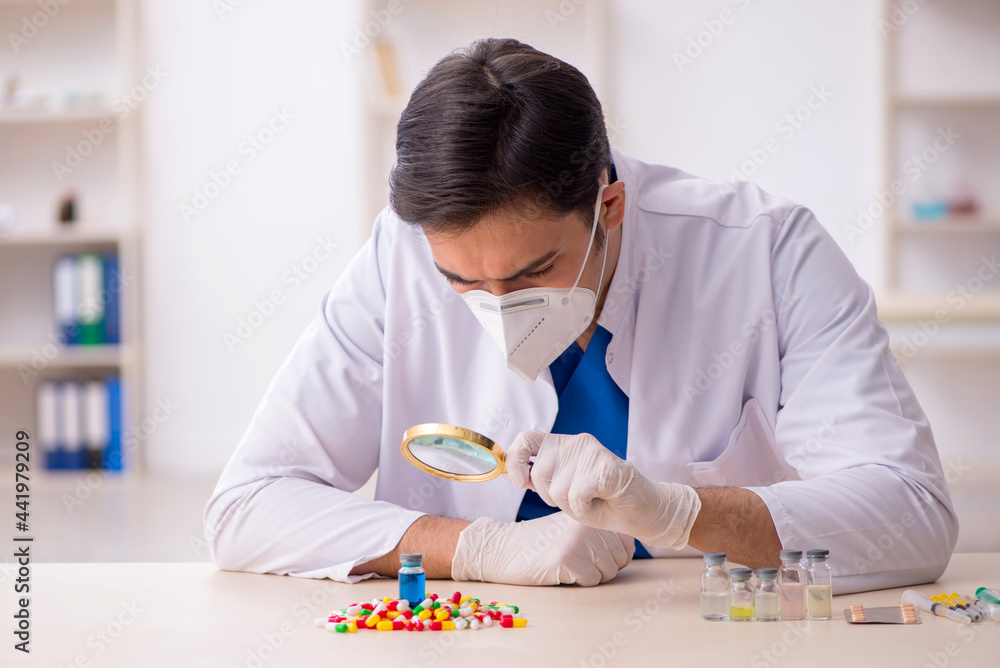 Young male doctor and too many pills Young male doctor and too many pills