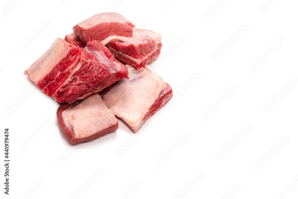 Raw beef ribs isolated on white background. Raw beef ribs isolated on white background.