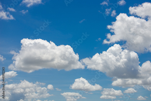 beautiful blue sky and white fluffy cloud horizon outdoor for background.