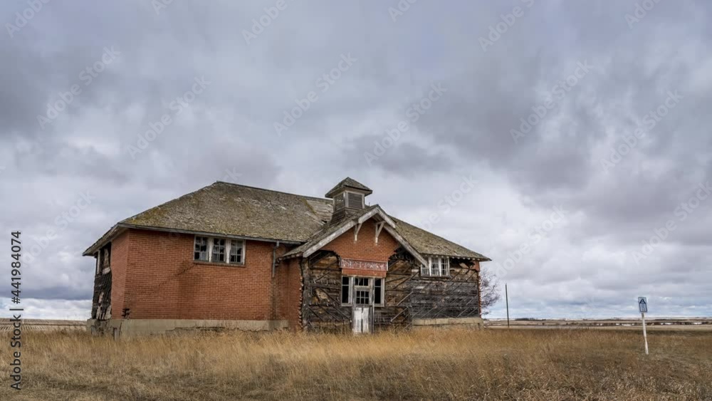 Old abandoned brick school house on the prairies. Old abandoned brick school house on the prairies.