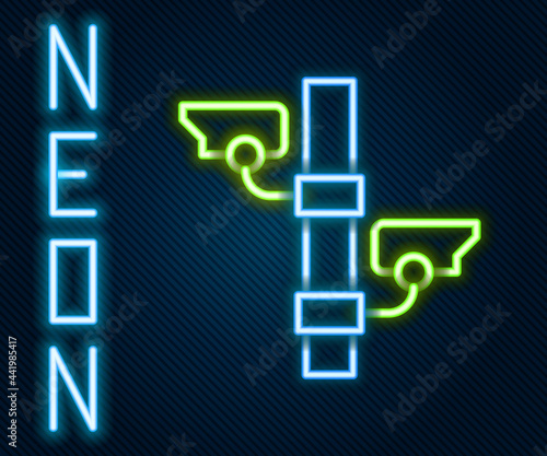 Glowing neon line Security camera icon isolated on black background. Colorful outline concept. Vector