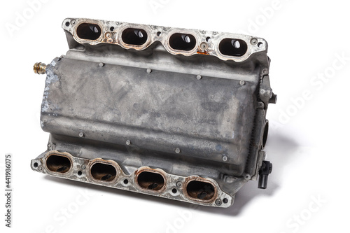 Intake manifold metal housing with a system for adjusting the air flow to the engine. Repair and replacement of spare parts of vehicles in a car service.
