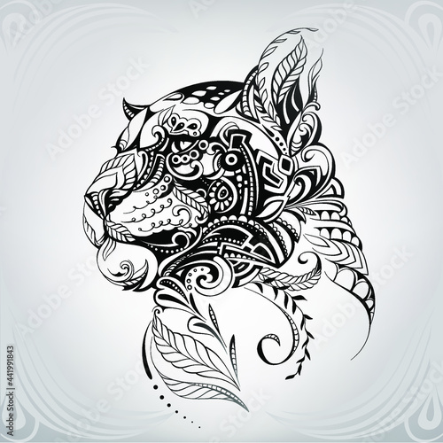 Panther head in floral ornament