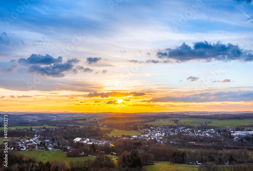 Sunset, Aerial view over forests and meadows of Westerwald, Altenkirchen, Germany