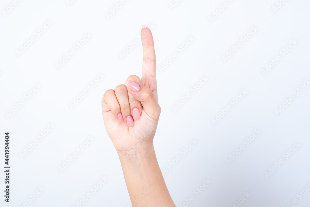 hand isolated on white background pointing up with finger number one. hand isolated on white background pointing up with finger number one.