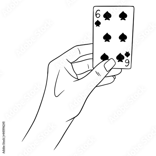 Gambling. Playing card in hand. Casino, luck, fortuna. Six of spades.