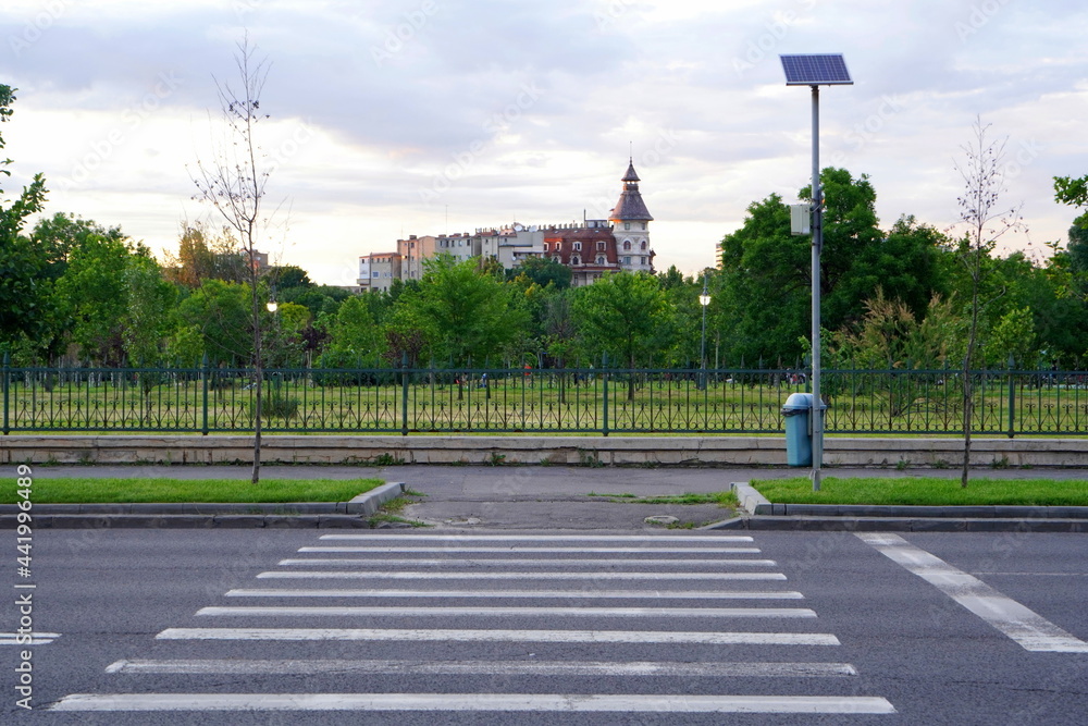 Naklejka premium Old buildings in Bucharest, viewed over Izvor park, at twilight 