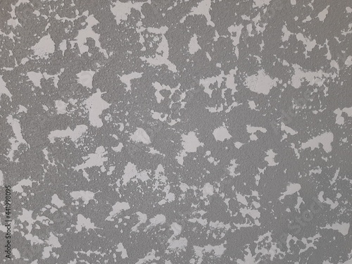 Textured putty in gray-white color.