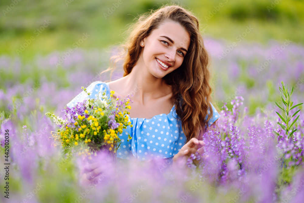 Portrait of beautiful woman in amazing in a blooming field. Nature, vacation, relax and lifestyle. Summer landscape. Portrait of beautiful woman in amazing in a blooming field. Nature, vacation, relax and lifestyle. Summer landscape.