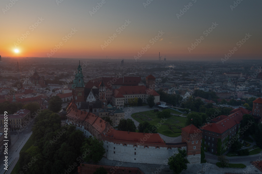Sun rises over the Wawel Castle. Krakow, Poland.