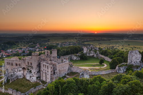 Sun rises over the Ogrodzieniec Castle. Podzamcze  Poland.