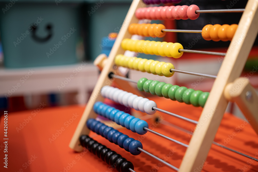 Colourful wooden toy , child wooden educational toy, selective focus Colourful wooden toy , child wooden educational toy, selective focus