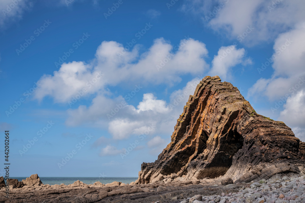 Beautiful landscape image of Blackchurch Rock on Devonian geological formation on beautiful Spring day