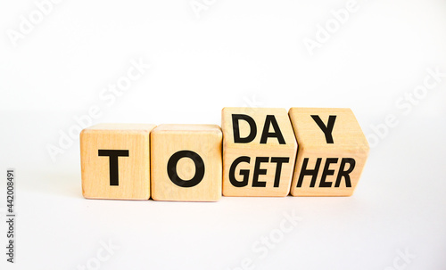 Today we are together symbol. Turned wooden cubes and changed the word together to today. Beautiful white background, copy space. Business and today we are together concept.