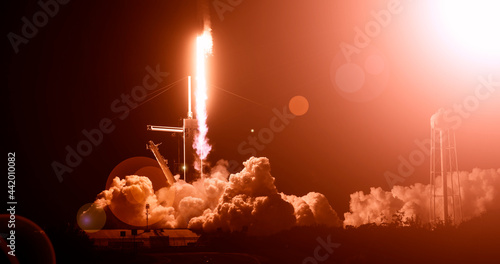 Fototapeta Naklejka Na Ścianę i Meble -  Cloudy rocket launch. The elements of this image furnished by NASA.