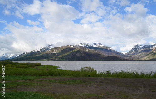 Late Spring in Grand Teton National Park: Elk Mountain, Wilcox Point, Cloud-Capped Ranger Peak with Mount Moran in the Distance All Seen from Mud Flats Overlook Along Jackson Lake