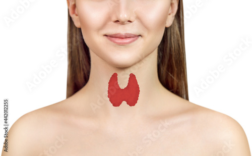 Young woman with visual thyroid on her sore. Thyroid control of women. photo