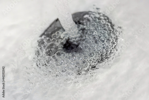фотографія jet of water and bubbles around