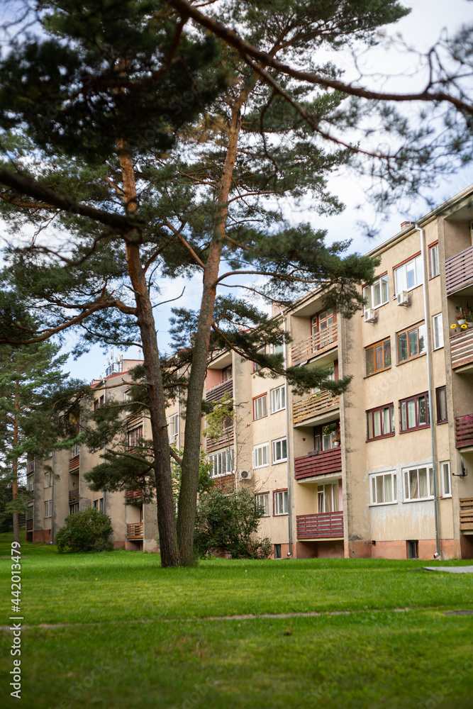 Four storey, residential block of flats house (Khrushchyovka).