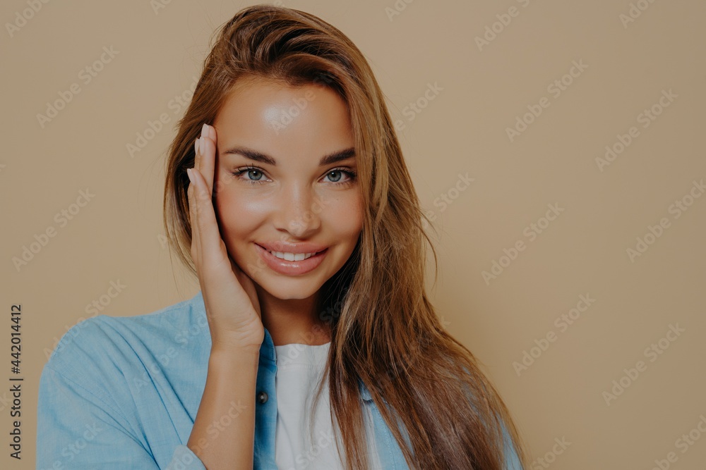 Close up photo of beautiful young caucasian woman with long straight hair Close up photo of beautiful young caucasian woman with long straight hair